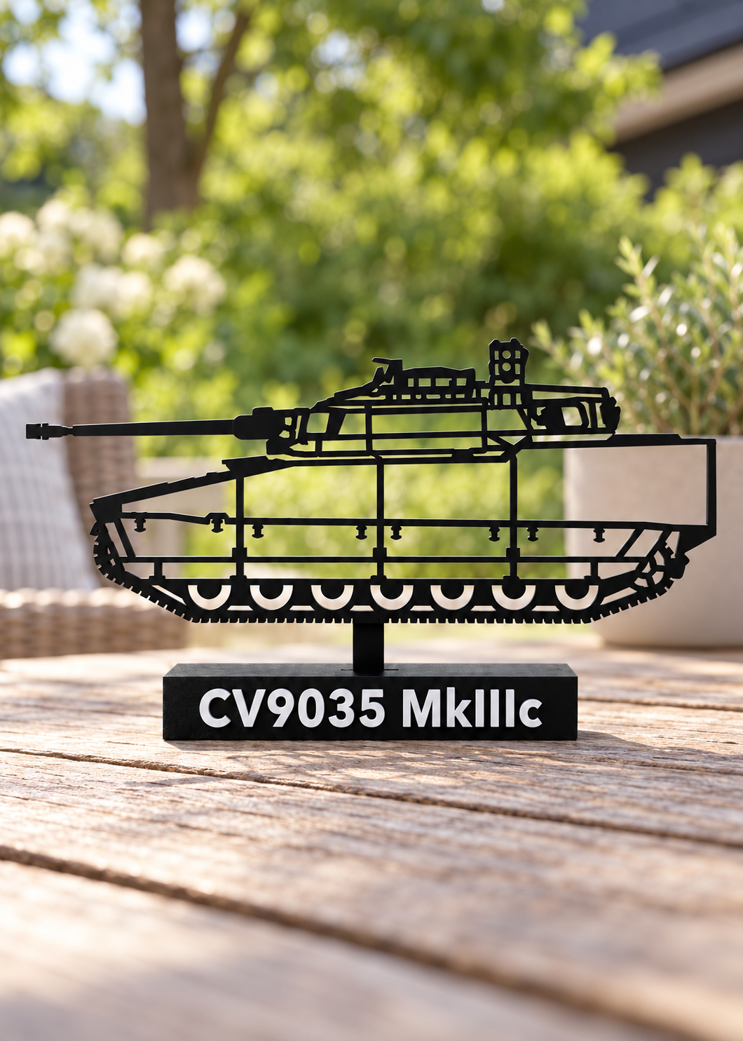Updated CV9035 MkIII C silhouette on an outdoor wooden table, digital lifestyle preview.