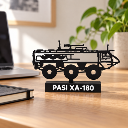Lifestyle preview of the Finnish PASI XA-180 silhouette display model on a wooden home-office desk, with its labelled black base.