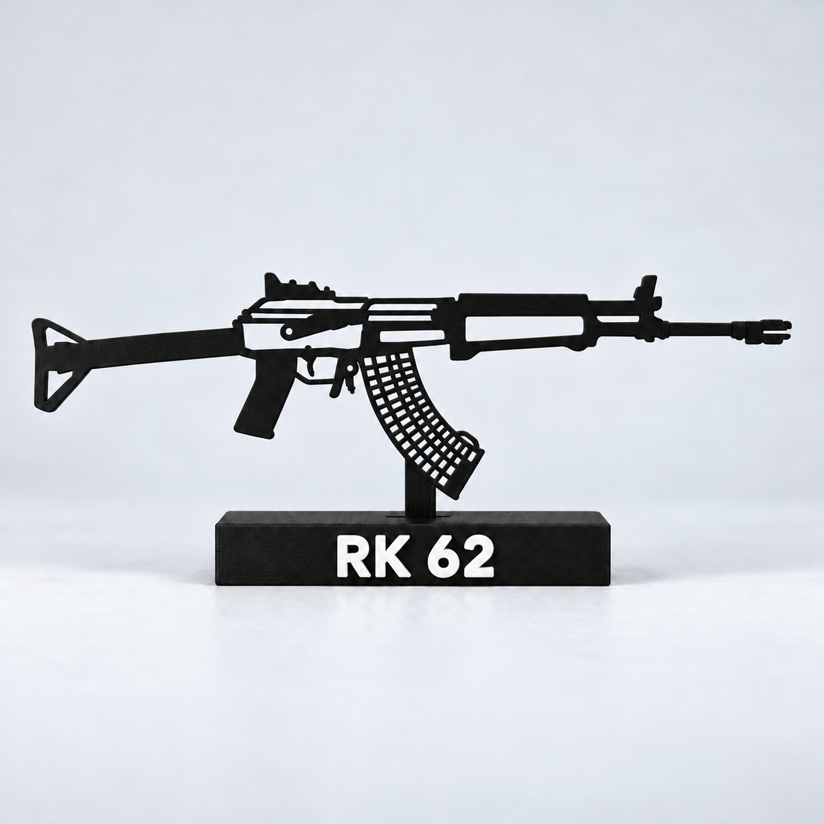 Digital studio preview of the updated RK 62 decorative silhouette model, with reinforced open detail lines, matte black finish and labelled display base.